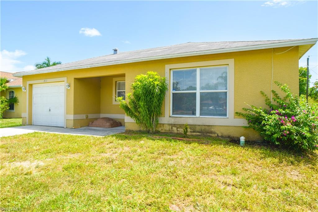 This gem has been recently updated and is awaiting it's new owner! Located ON THE LAKE! Brand new flooring throughout - tile flooring in all wet areas including the entryway, kitchen, dining area and both bathrooms. Laminate Free Floating flooring throughout the main living area, in the hallways and all three bedrooms. Brand new white kitchen cabinets, beautiful granite, and white appliances - all just installed! Fresh paint throughout the entire interior! This home has prime location and will not last!