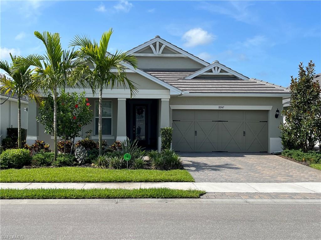 Tidewater is a wonderful community with a great location.  The amenities are very nice with a large amount of activities.  This 2 year old Summerwood located on the lake side with an extended screened lanai with hurricane roll downs.  All exterior window and doors are impact glass.  Large laundry room with cabinets and laundry sink.  White shaker cabinets through out, gas community with a gas cooktop and all appliances are Kitchenaide.  Quartz counters, closet has builtins and much more.