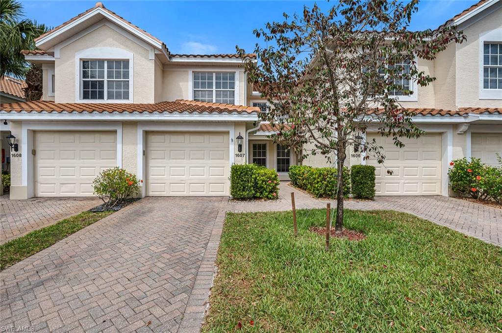 Experience the ultimate in luxury living with this stunning first-floor coach home in Stratford Place, Naples. Impeccably maintained and ready for new owners, this beautifully designed residence features a seamless floor plan, including 2 bedrooms, 2 bathrooms, a den, and an attached 1-car garage. The updated bright kitchen boasts granite countertops, a custom backsplash, a breakfast nook, and a pantry, making it perfect for both cooking and entertaining. The spacious master suite includes dual sinks and a walk-in shower, offering a relaxing retreat after a long day. Enjoy stunning views from your outdoor screened lanai, which overlooks the relaxing lake and is perfect for sipping your morning coffee or enjoying evening cocktails. The lanai is equipped with hurricane shutters, providing added security and peace of mind. Located in the highly desirable gated community of Stratford Place, this coach home is situated in a prime location, close to all the shopping, dining, and beaches that Naples has to offer. Additionally, the community is located in an A+ school district and features a community pool and plenty of extra guest parking, making it the perfect place to call home.