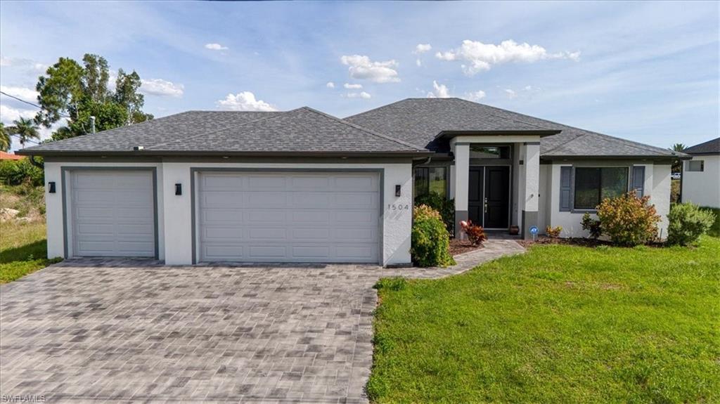 Welcome to your Southwest Florida waterfront dream home in Cape Coral! Built in 2021, this stunning residence offers the perfect blend of luxury, comfort, and the Florida lifestyle. Located on a beautiful freshwater canal with desirable southern exposure, this home provides peaceful water views, abundant wildlife, and access to a scenic lake.

Enjoy resort-style living in your private backyard oasis featuring a heated saltwater in-ground pool and spa, an outdoor kitchen perfect for entertaining, and a spacious lanai overlooking the tranquil canal. Spend your mornings fishing from your private dock or relaxing while taking in the natural beauty and wildlife that surrounds the property.

Inside, this thoughtfully designed home offers a spacious and functional layout with modern finishes throughout. The dedicated office/den features a beautiful built-in desk, creating the perfect workspace. The home includes a spacious primary suite along with a second master suite featuring a private en-suite bathroom, providing flexibility and comfort for guests or multigenerational living.

A standout feature of this home is the expansive 3-car garage, offering plenty of room for multiple vehicles, recreational toys, hobbies, and abundant storage space. Whether you need extra space for tools, bikes, water equipment, or everyday essentials, this garage provides the flexibility many waterfront buyers are looking for.

Additional highlights include a security system, newer construction, and a layout designed for both everyday living and entertaining. With its freshwater waterfront location, heated saltwater pool, spa, outdoor kitchen, private dock, and exceptional amenities, this Cape Coral home offers the ultimate Florida lifestyle.