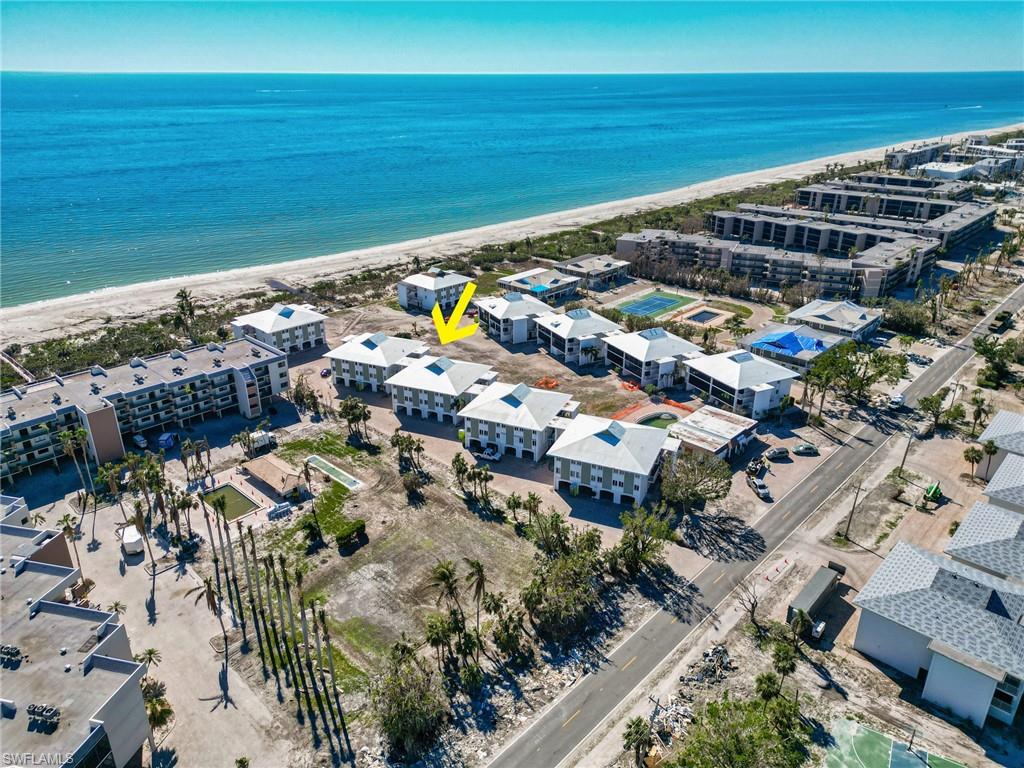 Sunset South 3D is a spacious 2bed/2bath beachfront condo with scenic partial Gulf views! This second-floor unit is filled with natural sunlight from the impact-resistant sliding glass doors and windows. Restoration work is already in process for the Sunset South complex to restore water and electricity, and replace roofs, HVAC, water heaters, garage doors, and interior drywall. This is your chance to own a Sanibel condo just steps from the beach and pool! A private garage with additional storage room is a rare bonus that not many condos on Sanibel include. Located on Middle Gulf Drive near the Donax Street intersection, you are just a short bike ride to the island's restaurants, shops, and businesses. Plus, enjoy easy access to the Causeway bridge.