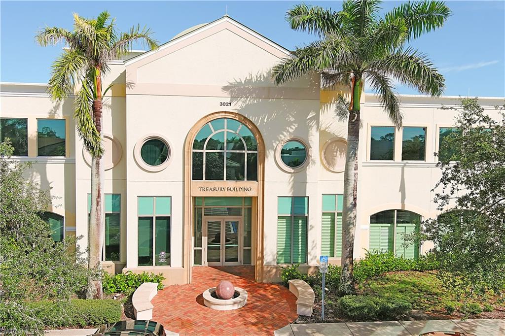 Price just reduced to 1,695,000 which is over $300,000 below recent appraisal. Located in the heart of Naples, this exquisite office condo is strategically positioned on Airport Pulling Road, just across from the prestigious Grey Oaks subdivision and adjacent to Poinciana Elementary School. With quick access to I-75, downtown Naples, North Naples, East Naples, and Naples South, this location is perfect for businesses looking for a central, easily accessible location. This first-floor condo, situated inside the Centennial Bank Building, offers versatility with C3 zoning, allowing for a wide variety of uses. Originally designed as a medical office, the space can easily be transformed into a variety of office environments, including a law firm, insurance company, real estate office, or any other business seeking flexible office space. Built in 2006, the condo offers approximately 4,257 square feet of space, featuring three A/C units (approx. 5 years old) and a new roof (approx. 2 years old). Ample parking is available for your clients and staff. The elegant common area foyer, with stunning marble inlays and a dramatic dome ceiling, sets the tone for this impressive property. Once inside, you’ll find a welcoming waiting area with LED lighting, crown moldings, and plantation shutters that provide beauty and privacy. Bamboo flooring flows through most of the 16 rooms, with some areas featuring carpet. Key features include: Spacious kitchen area, Conference room with tray ceiling, Private office space, Two storage/utility rooms, Two restrooms and one unisex restroom, Reception area with separate check-in/check-out sliding glass windows.Medical records or additional flex room, Built in wall safe, Electronics room, Plenty of cabinetry and storage space with its open layout and well-appointed features, this condo can easily accommodate your business’s needs, whether you’re looking for traditional office space or a versatile flex space solution.