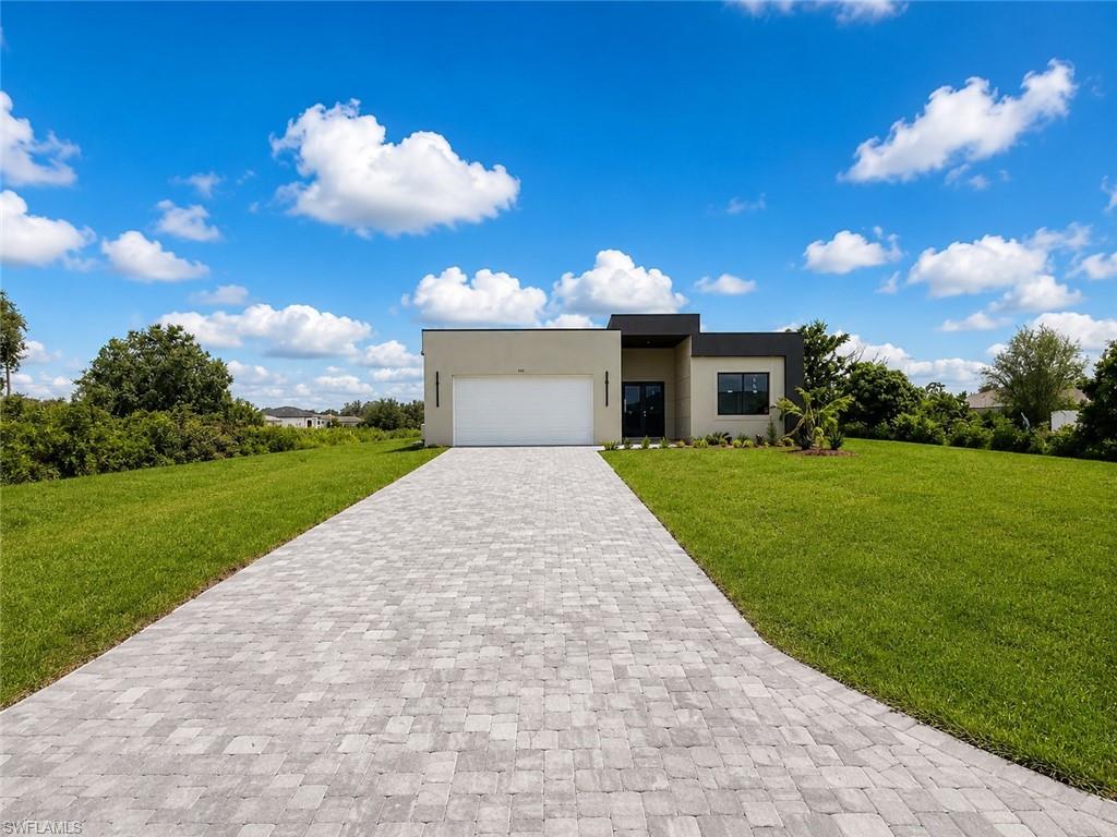 One or more photo(s) has been virtually staged, AI generated or rendered.  

Amazing location, 6 minutes from SR82!

Beautiful high-end 4 bedroom, 3 bathroom home featuring tray ceilings, 8 ft doors, impact windows and doors, and a spacious 2-car garage. The modern kitchen offers elegant wood panel cabinetry and Samsung appliances. Enjoy a paved driveway, sprinklers, screened windows, and a laundry room with washer/dryer included. A stylish, move-in ready home with quality finishes throughout! Creative financing options available
