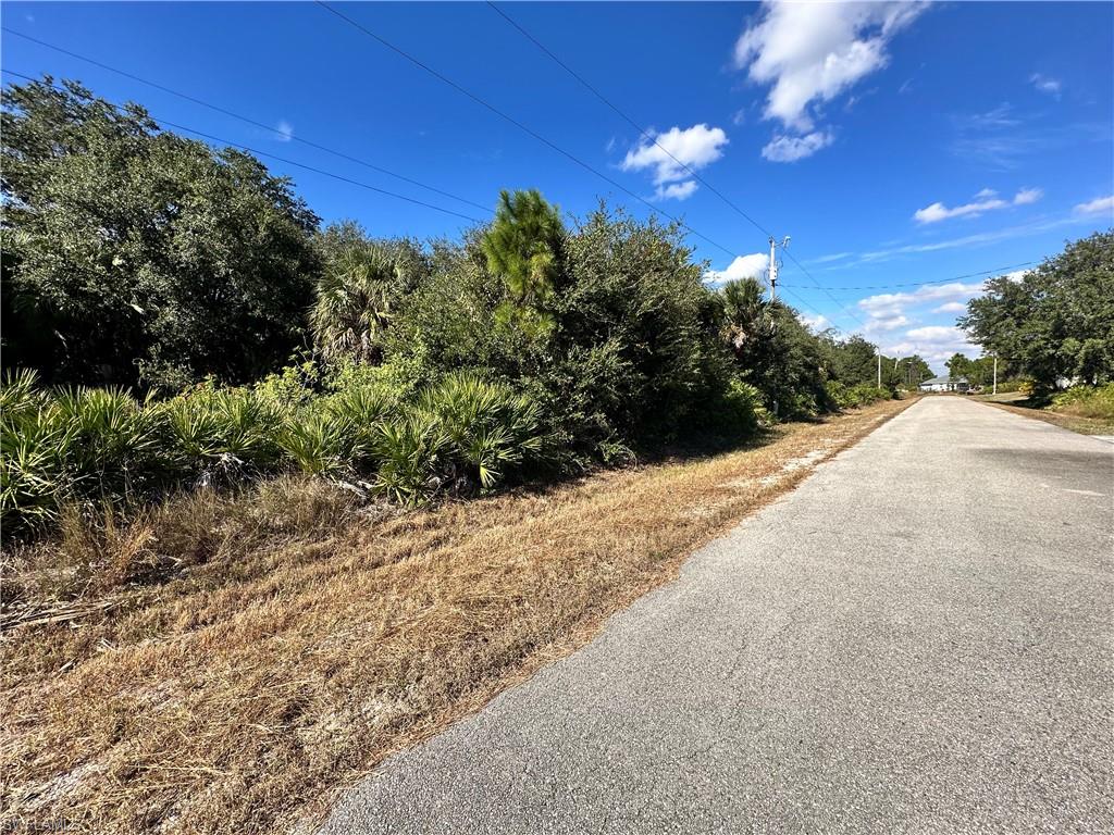 Excellent opportunity to build or invest in this 0.50-acre rectangular vacant residential lot, located on a paved road in Lehigh Acres. This non-HOA property is situated in a growing area with ongoing new construction, offering strong potential for a custom-built home or future investment. Conveniently located with easy access to main roads, shopping, schools, and everyday amenities. Ideal for builders, investors, or buyers looking to design and build their own home.
