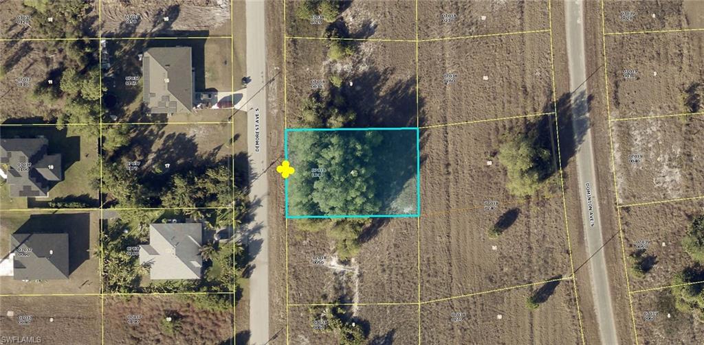 Your future starts here! This residential lot is ideally located in one of Lehigh Acres' most active growth corridors, offering the perfect combination of tranquility and convenience. Just minutes from SR-82, you'll enjoy quick access to Fort Myers, shopping, dining, schools, and RSW International Airport. Whether you're building your dream home or expanding your investment portfolio, this property is a smart opportunity in a thriving Southwest Florida market.