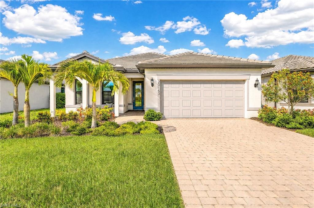 Better than new and TURNKEY furnished, this Pulte Mystique home in Verdana Village offers effortless Florida living with every detail already completed! Built in 2024, All IMPACT Glass and barely lived in, this 3 Bed + Den residence features quality upgrades, an Expansive Lake View with room for a pool, and a prime location near the community amenities. The open-concept floor plan showcases Quartz Countertops throughout, Natural Gas Range, beautiful wood plank Tile floors, and a Large Kitchen Island with seating great for entertaining. The spacious primary bedroom overlooks a Long Lake view creating a peaceful retreat and split bedrooms offer guests their own Suites. Enjoy Florida living from the Covered Front Porch, the perfect place to relax with your morning coffee or unwind in the evening while enjoying the beautiful weather year-round. The Extended Lanai provides tons of additional Outdoor Living Space with a Large Covered area and pre-plumbing for a future Outdoor Kitchen. Zero-corner Sliding Glass Doors create a seamless indoor-outdoor living space while filling the home with abundant Natural Light and capturing the beautiful Water View.The long driveway offers plenty of parking, and the home is ideally positioned with No Construction nearby. This Fully Furnished home is truly Move-In Ready, simply bring your suitcase.  Enjoy the convenience of a lock-and-leave lifestyle in a guard-gated community where lawn care maintenance is handled for you, making this ideal for both Full-time Residents and Seasonal Owners. Verdana Village offers an exceptional resort-style lifestyle with amenities including multiple dining options with an Outdoor Pool Bar and Restaurant, Indoor restaurant with Full bar, Café with Coffee Bar, Resort-Style Pool features Cabanas and an Oversized Hot Tub , Indoor Pickleball and Tennis Courts, Indoor Basketball Court, covered Outdoor Playground, Bocce, Dog Park, and a Large Fitness Center with Aerobic Studio and Locker Rooms. Located just minutes from Publix Super Market at Corkscrew Village, new restaurants, shopping, and ongoing development, Verdana Village provides the perfect combination of convenience, recreation, and low-maintenance living. Close to RSW International Airport, Miromar Outlets, Gulf Coast Town Center and a wide variety of shopping, dining, and entertainment options - making travel and everyday conveniences easily accessible. This is a rare opportunity to own a Nearly New, Fully Furnished home in one of Estero’s most desirable communities!