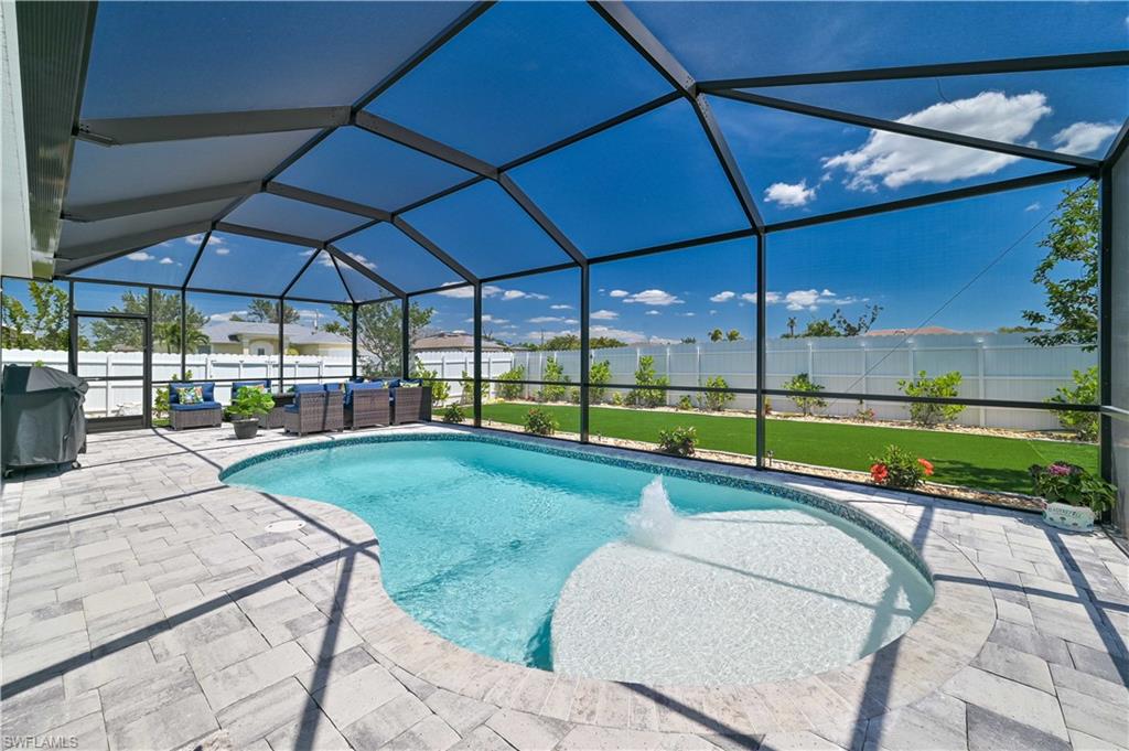NO FLOOD INSURANCE REQUIRED - FLOOD ZONE X. This 4 Bedroom, 2 Bathroom home offers the perfect mix of style, comfort, and convenience. Situated on a lushly landscaped corner lot and features a NEW ROOF (2023). Enjoy a bright, open layout with no carpet, new bedroom flooring (2022), and plenty of space to entertain. Step outside to your HEATED saltwater pool with paver deck (2022)—a true backyard oasis! With a 2-car garage and move-in-ready appeal, this home has it all!