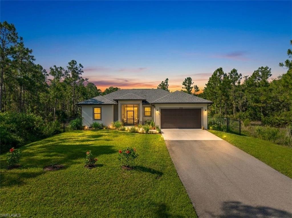 Welcome to 4432 45th Ave NE, Naples, FL! This beautifully maintained property offers a rare rental opportunity with electricity and internet included in the rent, thanks to the home's solar panel system, providing both convenience and significant monthly savings. Pride of ownership shines throughout this immaculate home, featuring lush landscaping and a variety of fruit trees and plants, including banana, passion fruit, dragon fruit, avocado, lemongrass, and lavender. Tenants will also enjoy the benefits of a whole-home reverse osmosis system, providing clean, purified water throughout the property. Step outside to a spacious finished lanai, perfect for relaxing or entertaining, and a fully fenced backyard with plenty of room for pets to play. Located in a peaceful setting while still being close to everything Naples has to offer, this exceptional home will be available for occupancy in mid-July. Schedule your private showing today—this one won't last long!