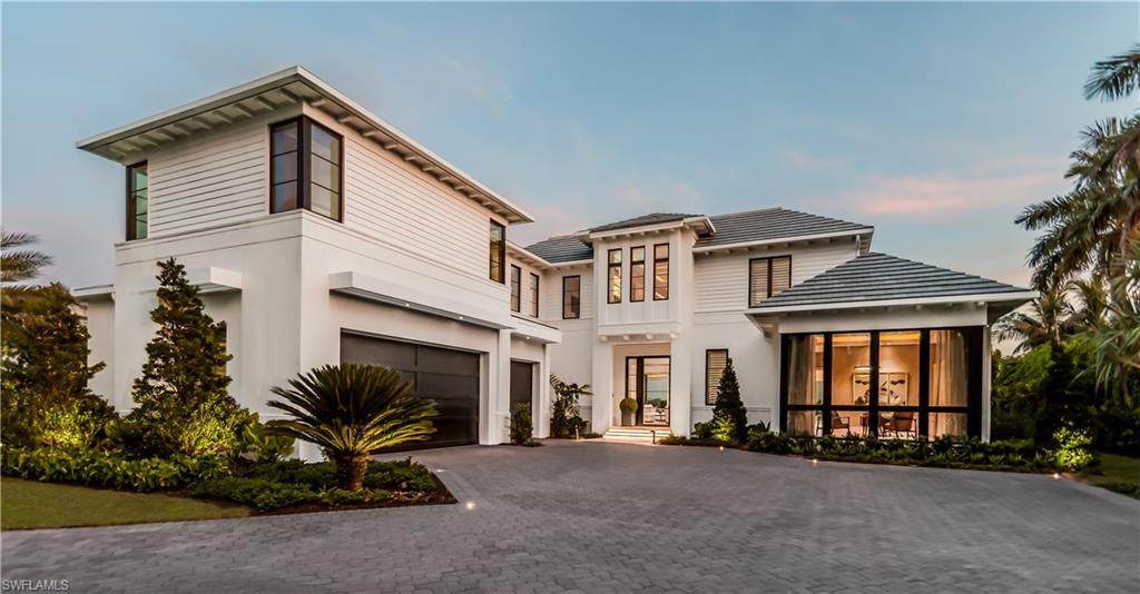 London Bay Homes assembled a dream team to create this remarkable Port Royal luxury home that showcases expansive views across Admiralty Bay to Keewaydin Island from virtually every room. Designed by Kukk Architecture, the open great room floor plan features elegantly appointed furnishings by Romanza Interior Design, a gourmet-inspired kitchen with freestanding breakfast island and an adjacent bar with ample wine storage. A private study near the master wing provides the ideal retreat. Pocket sliding glass doors lead to a stunning outdoor living area that includes a covered lanai with outdoor kitchen, as well as a wood deck with contemporary sectional and fire table - all overlooking a zero-edge custom pool and spa and unparalleled views. Whether by stairs or elevator, the upstairs bonus room with balcony is surrounded by a VIP guest suite and additional bedrooms. Home is scheduled to be completed mid-June 2020. Port Royal Club membership eligibility.
