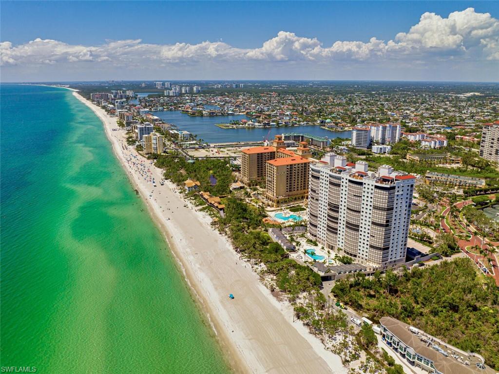 Nestled on the 14th floor of the prestigious Remington building in Bay Colony, Naples, this gorgeous condo offers a luxurious coastal living experience like no other. With breathtaking panoramic views of the Gulf of Mexico, residents can wake up to the soothing sound of waves and the sight of golden sunsets over the horizon. This spacious condo boasts modern elegance, featuring high-end finishes and top-notch amenities, providing the ultimate in comfort and style.

The Remington building in Bay Colony is renowned for its exclusivity and sophistication. Residents enjoy access to a host of upscale amenities, including a private beach club, concierge services, fitness facilities, and pristine swimming pools. The 14th-floor location ensures privacy and tranquility while being in the heart of Naples' most coveted community. Whether your lounging on your private balcony or exploring the vibrant Naples scene, this condo offers the perfect balance between serenity and entertainment.