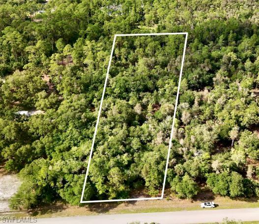 2.5-acre vacant lot situated in desirable Golden Gate Estates with PID: 38557440004. Excellent opportunity to build a custom home with space for additional structures, a pool, and outdoor living. Conveniently located near schools, shopping, dining, and major roadways. Area is typically served by private well water and septic systems, with electricity available nearby. This oversized parcel provides flexibility for residential or investment use in one of Naples’ fastest-growing acreage communities. Buyer to verify zoning, utilities, and land use with Collier County.