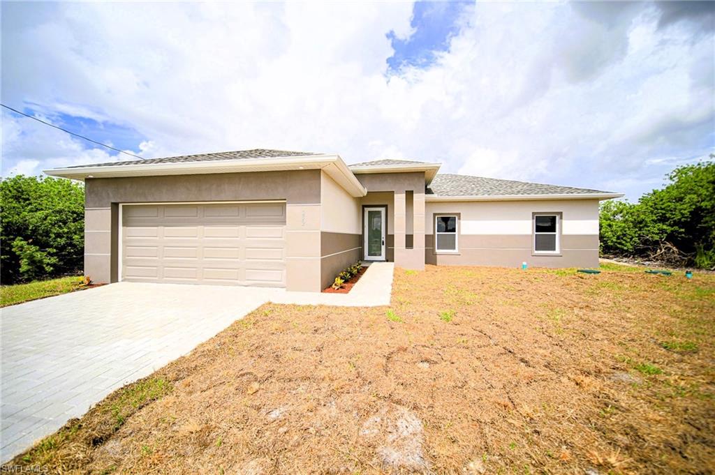 FRESHWATER CANAL HOME! FISH FROM YOUR OWN BACK YARD! You Will Be Amazed By The Quality Of This Brand New Construction 3 Bedroom (Plus Private Home Office/Den/Or 4th Bedroom With Solid Wood French Doors) 2 Bathroom/2 Car Garage Canal Home With Western Exposure For Those Stunning Florida Painted Sunsets, All On An Oversized 1/4 Acre Canal Lot In Lehigh Acres, FL. This Spacious Home Comes With 1682 SF Under Air And Is COMPLETELY Finished With A Certificate Of Occupancy (CO)! You Can Move Into This Home Today Or Use It As A Cash Flowing Rental Unit (Very High Demand). The Gourmet Island Kitchen Comes With Quartz Countertops, STAINLESS STEEL APPLIANCES, Real White Wood Shaker SOFT TOUCH Cabinet Doors & Drawers, Tile Backsplash, Floor To Ceiling Pantry, Stainless Steel Tub Sink, Modern Lighting, And A Large Breakfast Bar. Other Upgrades Include; FREE BRAND NEW WASHER AND DRYER WITH PURCHASE OF THIS PROPERTY, HURRICANE IMPACT GLASS WINDOWS AND DOORS, Large Designer High Gloss Porcelain Tile Flooring Throughout Entire Home, PAVER DRIVEWAY, High Ceilings, Large Living Room, Upgraded Baseboards, Large Dining Area, Custom Interior/Exterior Two-Tone Paint, Custom Ceiling Fans, Modern Lighting, Large Walk-In Closets, Quartz Countertops In The Bathrooms, Huge Back Yard, New Landscaping Package, Epoxy Coating In The Garage And On The Open Covered Lania, And A Laundry Area Including A New Washer & Dryer Inside Of The Home. This Home Is Very Close To Regional Shopping Malls, SR 82 And Fort Myers, Golf Courses, Interstate I-75, Regional Airport, FGCU, Restaurants, Schools, Golf Courses, MLB Spring Training Baseball, Outdoor Parks, Boat Ramps, Amazing Fishing, And Those White Sand Beaches Of The Gulf Of America! Pools & Fences Can Be Added! DOWN PAYMENT ASSISTANCE IS AVAILABLE!