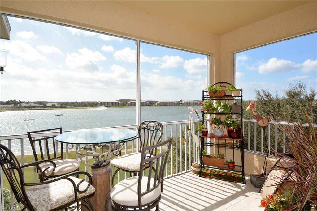 Wow...end unit on the top floor for added privacy and larger storage locker! This is the one you have been waiting for. It is near the clubhouse and next to the neighborhood pool!  The view is incredible with a great view of the fountain over the 38 acre lake and # 18 on the Royal course.  It looks like a model with refaced cabinets with pull outs, tile on the counter tops, tile in the living areas, built in office overlooking the lake, crown molding , new refrigerator, new AC and hot water heater, new shower in the master, microwave, crown molding and wide floor boards. It is beautifully furnished and is being offered turnkey per the inventory list...just a few exceptions. Bring your toothbrush and golf clubs and move right in. Heritage Palms is a very popular community with 36 holes of bundled golf, 9 swimming pools, 2 clubhouses, live music Fridays at the Tiki Bar, 8 Har-Tru tennis courts, pickle ball, fitness center with free classes, and many activities for an active an fun lifestyle. Watch the virtual tour and call for an appointment soon. The listing agent lives in HP if you have questions.  Don't wait...the good one's go fast!