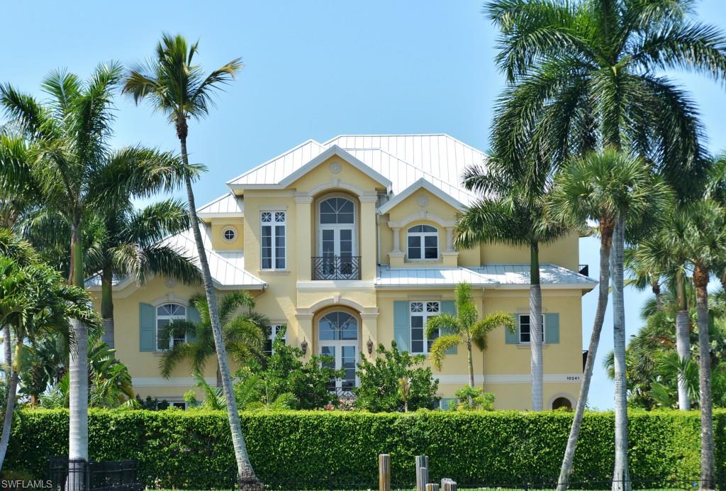 Once in a lifetime opportunity to own this direct beachfront home on one of the most desirable locations in all of Naples. Situated on 100’ of white pristine Vanderbilt Beach sand, this home offers 4 bedrooms, 4 full & 4 half baths, 4-car garage, 12'ceilings, priv elevator, sec system, impact glass w/turtle tint throughout. Main living level offers elevated pool & large deck overlooking the Gulf of Mexico, pool bath, large laundry room w/custom cabinets & sink, great room w/informal dining nook, large dining room overlooking the intercostal waterway, parlour w/fireplace & pocketing sliders for spectacular Gulf views. The gourmet kitchen features double ovens, 2 dishwashers, 2 built-in refrigerators, 5 burner cooktop, farm sink, granite countertops & butler's pantry w/2 built-in wine coolers. A stunning master bedroom opens to the pool & Gulf w/custom bath & 2 closets. 3rd floor offers 3 oversized guest suites, guest laundry, large office, guest sitting area & library w/large balcony overlooking the Gulf. Lower level features large rec room, exercise room, half bath & generator. Unparalleled views of the Gulf of Mexico can be found from nearly every room of this incredible home.