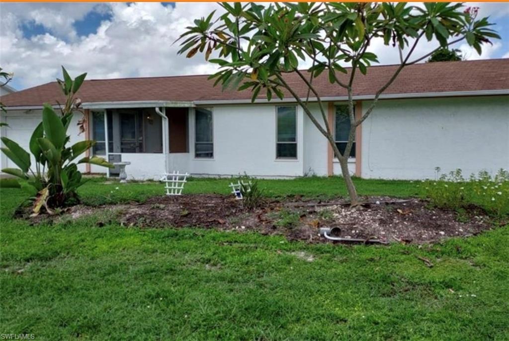Investors, First time home buyers this property in the middle of Golden gate city, Stainless appliances. Fully enclosed lanai with a beautiful custom ceiling 1 car garage. Ceiling fans in every room. AC replaced in 2016, Roof replaced 2017, large partially fenced backyard. New tile in the property and updated kitchen.