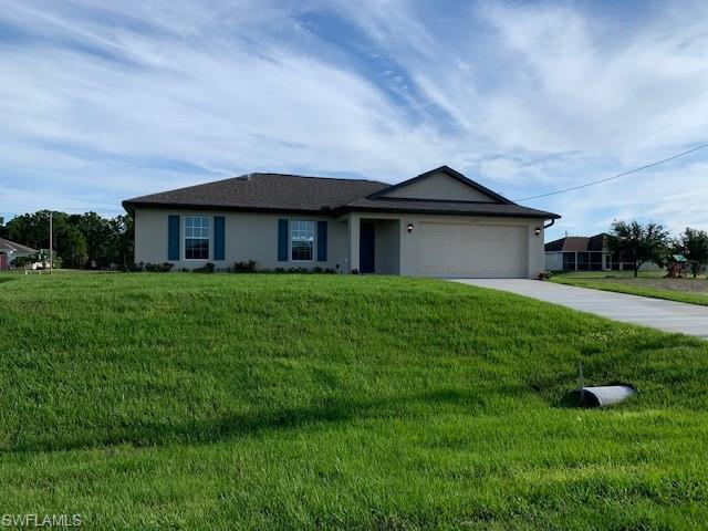 3/2 beautiful home in Northwest Cape Coral. Open floor plan with cathedral ceiling and kitchen overlooking living area. 18" title flooring throughout, Stainless steel appliances, irrigation system, water treatment system. Lenox 14 sneer high efficiency AC system. This home was built with quality of construction.