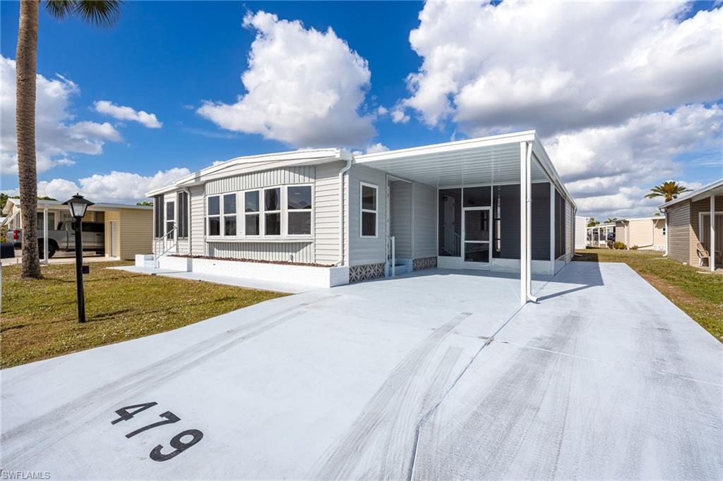 1st YEAR OF ASSOCIATION FEES PAID! Welcome to your dream home in the beautiful Six Lakes Country Club! This stunning manufactured home boasts 2 bedrooms, 2 bathrooms, and a plethora of upgrades that will make you fall in love at first sight. Imagine waking up every morning to the smell of fresh coffee in your brand new kitchen with modern cabinets and countertops. The luxury vinyl plank floors throughout the home add a touch of elegance and sophistication. The new roof in 2025 provides peace of mind knowing that your home is protected from the elements. Step outside to your new carport and screened lanai, perfect for enjoying the Florida sunshine all year round. And the best part? A golf cart is included, making it easy to explore the community and all it has to offer. With drywall ceilings and a spacious layout, this home is perfect for entertaining friends and family. Don't miss out on this incredible opportunity to own a piece of paradise in Six Lakes Country Club! Six Lakes is an active adult resident owned manufactured home community w/ Executive 18-hole golf course, putting green, tennis courts, pro-shop, restaurant, community pool/spa, exercise room, pickle ball, shuffleboard, billiards, and soooo much more. Golfing is not mandatory but enjoying your retirement is!