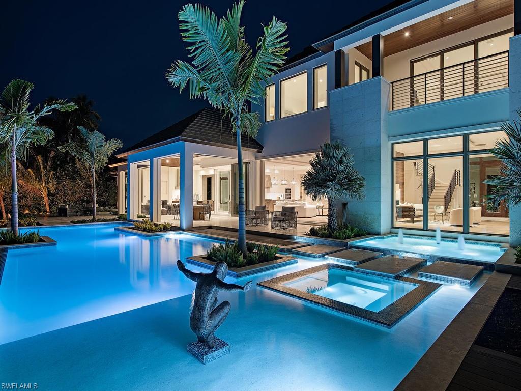 A truly sublime coastal contemporary residence is coming to Port Royal. The incredible team of A. Vernon Allen Custom Builders, Stofft Cooney Architects and Lisa Kahn Designs has been assembled to create this magnificent home. Modern in feel, the effect of this stunning property is light, fresh and connected. Clean lines and light, open spaces welcome you home to a peaceful environment. The open gracious indoor and expansive outdoor spaces provide sanctuary and flow together with common textures and materials. Natural wood tones have been layered with light colored stone, glass, raffia and palm matting. Handmade cabinetry by Traditional; a 6th generation German cabinet maker. Situated at the base of a cul-de-sac, the oversized .72 acre lot (approx.) with 236 feet of water frontage offers expansive water views. This deep water location is on Old Harbour Channel and only a short stroll to all of Port Royal Club’s private amenities; fitness, tennis and the legendary beach club. Eligible for immediate Port Royal Club membership.