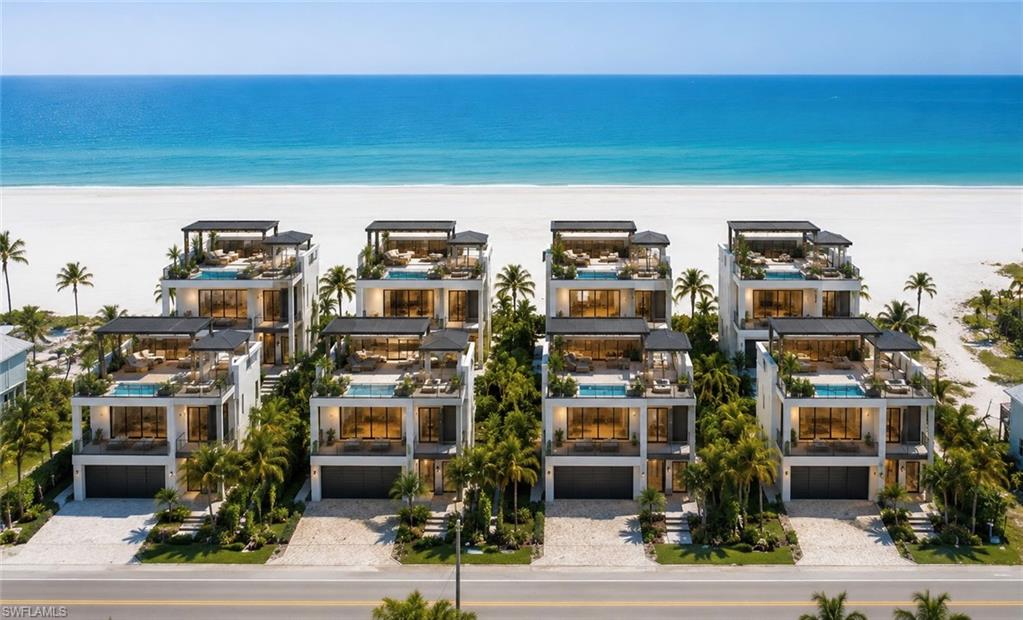 One or more photo(s) has been virtually staged, AI generated or rendered.  5256 Estero Boulevard presents a rare and captivating Gulf-to-Boulevard assemblage on Fort Myers Beach. Spanning over ½ acre with 90 feet of direct Gulf frontage and approximately 270 feet of depth, this exceptional offering provides an unmatched opportunity for investors, developers, or those seeking to create a legacy beachfront estate. (See the adjoining 5300 Estero assemblage for additional Gulf-front opportunities.)

The property consists of three parcels, including two Gulf-front single-family residences offering a combined 8 bedrooms, 6.5 bathrooms, and more than 4,500 square feet of living space, along with a large multifamily parcel extending to Estero Boulevard. This rear parcel can also be divided into two single-family homesites, creating an irreplaceable development footprint in one of Southwest Florida's most desirable beachfront locations.

Zoned for weekly rentals and new elevated construction with private pools, the property offers exceptional flexibility for luxury vacation homes, a boutique beachfront resort, an exclusive residential compound, or a high-performing income-producing investment. The weekly rental zoning significantly enhances the property's revenue potential while maximizing future development opportunities.

For those seeking an even larger vision, 5256 Estero Boulevard can be combined with the adjacent 5300 Estero assemblage, creating nearly one acre with approximately 180 feet of continuous Gulf frontage—one of the largest and most prestigious contiguous beachfront holdings on Fort Myers Beach.

With extremely limited Gulf-front inventory and the island's continued redevelopment, this is a once-in-a-generation opportunity to secure a premier beachfront investment offering exceptional scale, outstanding income potential, long-term value, and lasting legacy appeal in the heart of Fort Myers Beach.