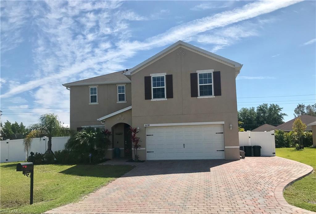 JUST REDUCED!!!! THIS HOME IS LISTED UNDER APPRAISED VALUE! (available upon request) 
Welcome home to this gorgeous 4 bedroom + den, 2 & 1/2 bath, 2 car garage home. Better than new with so many upgrades! Built in 2016. This beautiful and spacious home boasts 2470 sq. feet of open living space. No Carpet! Brand new gleaming hardwood floors and tile throughout. Upgraded granite, new appliances and nice center island in the kitchen. Large walk in pantry for extra storage. Huge master suite and fully remodeled bathroom with marble countertops and added storage. Added extra electricity in garage. Security system. There is also a custom built in dog house under the stairs! Extended paver driveway. Fully fenced in private backyard with extended paver patio and screened lanai. ALSO NO HOA FEES! Perfectly located just 6 miles to the beaches, close to schools, restaurants, Miromar Outlet Mall, Coconut Point Mall, and minutes to I-75. Don't miss the chance to own this perfect family home!