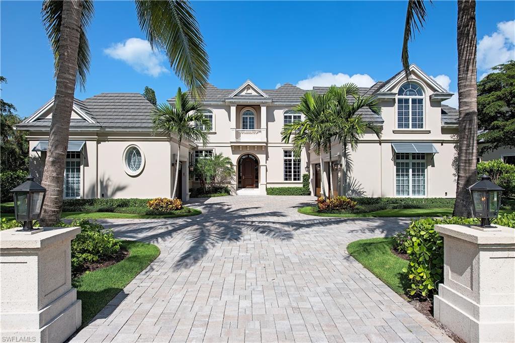 Like-new,  Port Royal...beautiful custom home, built in 2015 by BCB homes.  6,832 square feet under air.  Expansive outdoor living area with infinity pool, spa, outdoor kitchen and dining, with a fire-pit for entertaining.  Beautiful  first floor master suite with his and her bathrooms and individual walk in closets.  There is a separate office/den with outside entrance. A second master suite with a private large balcony enjoys the long water view.  3 additional guest suites for a total of 5 bedrooms.  Private upper lounge area for guests.  3 car garage. Boat dock with lift.  Membership availability to the Port Royal Club