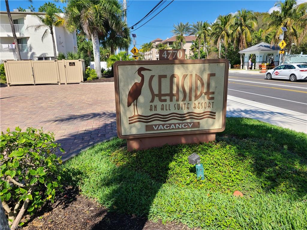 Direct BEACHFRONT condominium on the GULF OF MEXICO!!!  This is the only unit available now at the charming SEASIDE ALL-SUITE RESORT located mid-island directly across the street from Publix, Snook Bite Marina, and Bayfront Bistro!! Don't miss this great RENTAL OPPORTUNITY with a 3 day minimum rental period!  You will feel like you are right on the beach while enjoying your morning coffee from your first floor balcony!  This tastefully decorated beach condo is offered TURNKEY.  Kitchen and bathrooms are updated with granite counters, shaker cabinets and beautifully tiled walk in shower in master bath and shower/tub combo in second bath with glass doors in both!  It has also been recently painted and both bedrooms and the living room have flat screen TVs so it is all ready for you to move in!  This unit includes COVERED PARKING that is located close to the elevator!!!