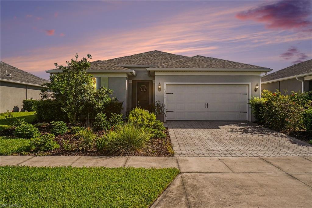 Welcome to luxury lakefront living in the highly sought-after Parkside community of Babcock Ranch! Built by Pulte Homes, this beautifully designed 3-bedroom + den, 2-bath pool home combines modern finishes, exceptional craftsmanship, and an unbeatable location.
Step inside to discover an open-concept floor plan featuring tile flooring throughout, quartz countertops, and a spectacular full pocketing zero-corner sliding glass door that seamlessly blends indoor and outdoor living. The expansive covered lanai overlooks a sparkling saltwater pool and tranquil lake views, creating the perfect space to entertain guests or unwind in your own private backyard oasis.
The flexible den is ideal for a home office, media room, or guest space, while the split-bedroom layout provides comfort and privacy. Automatic Hurricane-impact window shutters offer year-round peace of mind, and the epoxy-coated garage floor adds both durability and a polished finish to the spacious garage.
Ideally located just a park away from the exciting new B Street District and within walking distance of Founder's Square, you'll enjoy easy access to restaurants, shopping, community events, live entertainment, and the vibrant lifestyle that makes Babcock Ranch one of Southwest Florida's premier communities.
Enjoy miles of scenic walking and biking trails, beautiful parks, lakes, playgrounds, community pools, and all the amenities of America's first solar-powered town. Whether you're searching for a full-time residence or a seasonal retreat, this exceptional lakefront home offers the perfect blend of style, comfort, and location.