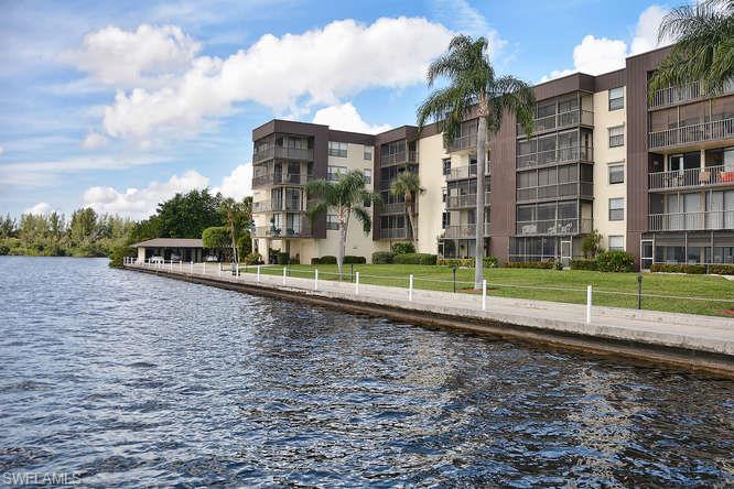 Professionally Remodeled Top Floor Condo With Water Views Nestled In Sunny North Fort Myers Florida! This Fully Renovated 2 Bedroom, 2 Bath, Single Carport Unit Has Updates That Include New 18 Inch Ceramic Tile In The Kitchen And Bathrooms, New Interior Paint, New Carpet, New Kitchen Cabinets And Bathroom Vanities, New Granite Counters In The Kitchen And Baths, New Travertine Tile Backsplash In The Kitchen, New Stainless Steel Energy Star Appliance Suite, New Toilets, New Brushed Nickel Finishings And Light Fixtures, New Ceiling Fans And New Doors. Enjoy The Large Screened Rear Patio Overlooking The Peaceful Lake And Pool. This Secure Gated Community Offers A Quiet And Peaceful Environment. This Residence Shows Like A Model. Come By And See It Today!