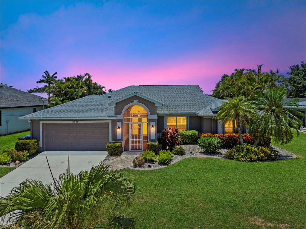 Imagine waking up, pouring your coffee, and heading out to the lanai. The pool's right there. Your boat's on the dock behind the house. That's a regular Tuesday in this home.
This fully remodeled 3-bedroom, 2-bath sits on a Gulf access canal in SW Cape Coral. Drop the lines and you're cruising the waterways in minutes.
Inside feels light and easy. Porcelain tile runs through the whole house, so sandy feet and wet swimsuits aren't a problem. The kitchen has quartz counters, 42" white Thomasville cabinets, and stainless appliances. Four sets of sliders pull the outside in. You'll notice how bright it stays, even late in the day.
Out back is the good part. The screened saltwater pool went in back in 2023. Southern exposure means the deck catches sun all year long, which is exactly what you want come January. The lanai is big enough for a table, loungers, and still room to move. Tropical landscaping wraps the yard and gives you privacy.
Here's the part that lets you relax. The solar panels are paid in full and save about $4,000 to $5,000 a year, current electric bill per month not more than $25.00. Solar panels for pool heating have been added and are a huge benefit especially in the winter months. Roof from 2019. HVAC from 2020. Hurricane impact windows all around. No HOA fees, assessments are paid, and you've got city water and sewer. This home has never flooded.
You could be sitting by that pool this season. Come take a look.