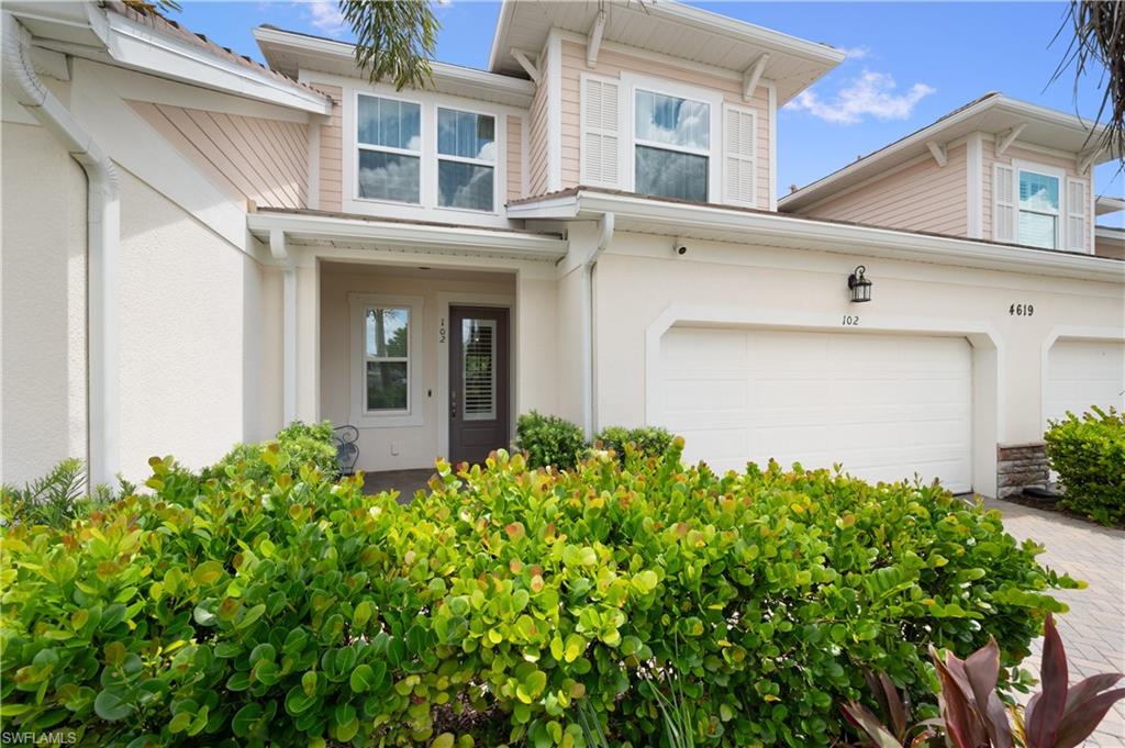 Live the relaxed Naples lifestyle in this bright and stylish 3-bedroom plus den, 2.5-bath townhome in the Arboretum community. With a firstfloor master suite, attached two-car garage, and bonus room under A/C, this home offers comfort, convenience, and flexibility. The modern kitchen features quartz countertops, stainless steel appliances, and a spacious island that opens to the living and dining areas. Upstairs, enjoy two guest bedrooms, a full bath, and a versatile loft space. Step out to a screened lanai surrounded by lush, tropical landscaping—ideal for morning coffee or evening wind-downs. Arboretum offers gated, resort-style amenities including a pool and spa with cabanas, fitness center, fire pit lounge, grilling stations, and a dog park. Located near the Naples Botanical Garden, Celebration Park, Sugden Park, and the Gulf beaches, you’re just minutes from shopping, dining, and entertainment on 5th Avenue South. This low-maintenance, well-appointed home is perfect for seasonal residents, full-time living, or investment. Schedule a private tour today and see what makes this Naples townhome truly special.