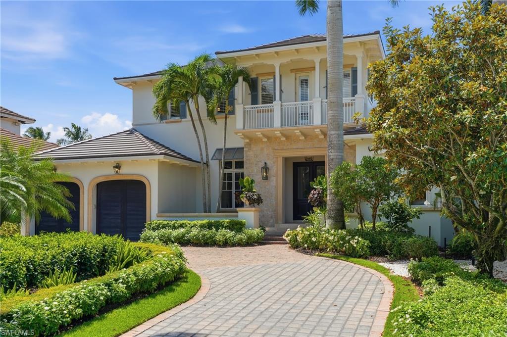 Perfectly positioned on over half an acre in the prestigious community of Aqualane Shores, this extraordinary estate embodies the essence of refined coastal luxury. This timelessly updated residence offers an unparalleled blend of sophistication, privacy, and effortless Naples living just four homes from Naples beach. 

Masterfully designed by the renowned Stofft Cooney Architects, the home is a showcase of exceptional craftsmanship and thoughtful design. From the moment you enter the grand foyer, you are welcomed by rich architectural details including high ceilings, and expansive living spaces designed to capture natural light and tranquil lake views throughout.

Spanning five en-suite bedrooms plus a study, the residence offers an ideal balance of elegant entertaining and relaxed everyday comfort. The chef’s kitchen serves as the heart of the home, seamlessly connecting to a spacious family and club room, while a formal dining area create a timeless setting for gatherings both intimate and grand. The luxurious first-floor primary suite provides a serene retreat with a spa-inspired bath including an outdoor shower, while an additional guest suite on the main level ensures comfort and privacy for visitors.

The home’s south-facing outdoor living experience is perfection. Designed for privacy, the expansive lanai features a fireplace, summer kitchen, and multiple lounging areas overlooking a tropical pool and spa with cascading waterfall features. Surrounded by lush landscaping and peaceful lakefront vistas, the setting feels like a private island sanctuary in the heart of Naples.

Upstairs, three beautifully appointed guest suites each offer ensuite baths, while a stunning rooftop terrace provides the perfect vantage point to enjoy sunsets, Gulf breezes, and the serene beauty of the surrounding landscape.

Located just one block from the beach and moments from the boutiques, fine dining, and vibrant charm of Third Street South, this remarkable residence captures the very best of the Naples luxury lifestyle. Where timeless architecture, tropical beauty, and an unrivaled location come together in perfect harmony.