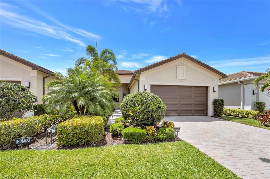 Beautiful and well maintained 2 bedrooms plus a den, 2 bath, 2 car garage villa. Open concept floor plan which combines dining/living area. You can view the lake from living room area or screened in lanai that has an extended deck right outside the door. Lovely kitchen equipped with Stainless steel appliances; custom panty and countertops; backsplash and a breakfast area. Home comes with plantation and hurricane accordion shutters. Owner's suite has tray ceilings and custom closet organizers. Owner's bath has double vanities and a walk in shower. There is a laundry room with a washer/dryer and laundry tub. This is a gated 55+ community just located east of I-75 off Bonita Beach Road. Amenities included are a Clubhouse with an outdoor fire pit area; two swimming pools; a lap pool; cabanas; dog park; outdoor bar with tv's; restaurant and game room; Bocce court and much more. Furniture is Negotiable.