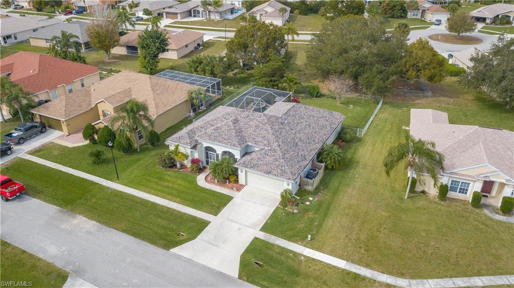 This 4 bedrooom, 2 bathroom pool home sits on an oversized lot within the gated community of Varsity Lakes where HOA's are only $150 per quarter! The roof and A/C system are new as of 2017 and the salt water pool and all associated equipment are four years young, saving you thousands in replacement costs for YEARS to come! The floor plan splits the master suite from the rest of the guest rooms, and it offers formal dining and living spaces along with casual dining at breakfast bar, the kitchen features wood cabinets, granite tops, and stainless steel appliances.  There is a sprinkler system for the entire property and the rear of the property is fully fenced in. The neighborhood is seated within just a few miles to the international airport, I-75, and all of the major shopping areas of Fort Myers.