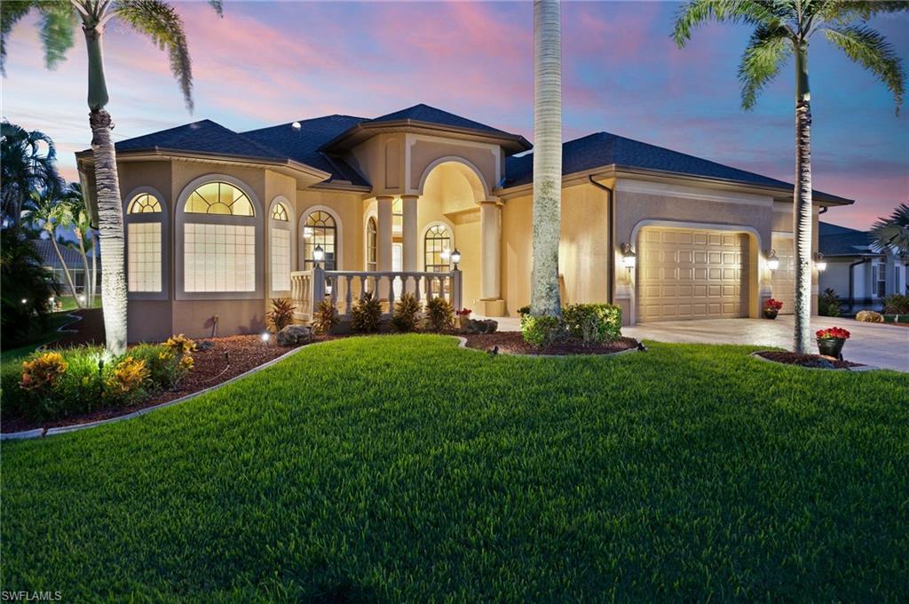 Welcome to your SW Cape Coral Gulf Access Paradise! Nestled in the highly sought-after Surfside neighborhood, this exceptional property boasts over 3,000 sqft of meticulously maintained living space. 4 Bedrooms, 3.5 Baths, a Library, and an expansive 3-car garage offer an abundance of room for the family to enjoy.
Step outside into your own private oasis, complete with a southern exposure saltwater pool featuring a large spill-over spa and an integrated fountain. A newly screened paver lanai beckons you to relax and enjoy the serene surroundings. The lanai leads to an impressive captain's walk and wrap-around dock, complete with a boat lift and jet ski lift, making this a true boaters' delight.
This residence has been designed with complete hurricane protection, ensuring peace of mind during storm seasons. All windows and multiple sets of impact-resistant sliders safeguard your home and loved ones.
Inside, the living space features soaring tray ceilings in the wide-open great room, perfect for entertaining guests. The well-appointed kitchen boasts granite countertops, ample cabinets, a double wall oven, and stainless appliances, making it a dream for any home chef. New Roof 2023