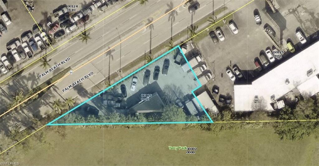 This commercial parcel is ideally positioned along highly trafficked Palm Beach Boulevard in Fort Myers, offering exceptional visibility and accessibility. The property features 196 feet of frontage, providing outstanding exposure to steady daily traffic flow—making it well-suited for a variety of retail or automotive-related uses. Currently operating as an automobile sales business, the site is fully improved with a blacktopped parking area that maximizes usable space and accommodates multiple vehicles for display or customer parking. A small on-site office building supports operations and provides a functional base for sales or administrative use.
With its strategic location on a major thoroughfare, unusually strong frontage, and existing infrastructure, this property presents an excellent opportunity for investors or owner-users seeking a turnkey commercial site in a growing corridor of Fort Myers.