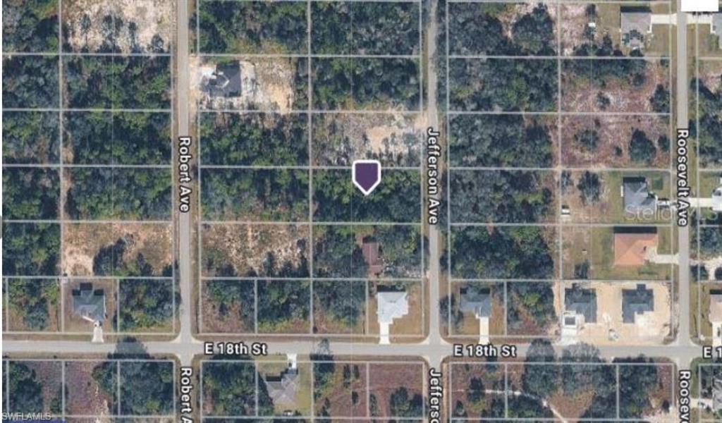 Buildable Large Half Acre Lot in Lehigh Acres in a rapidly expanding community. Plenty of room for a Garage, pole barn and pool back yard paradise. Take advantage of close proximity to schools, shopping and utilities. This property is near the main road and just a short walk to the Frank Mann Preserve with Hundreds of acres to explore on kayak or foot. No HOA or flood zone, Ready to build your dream home.