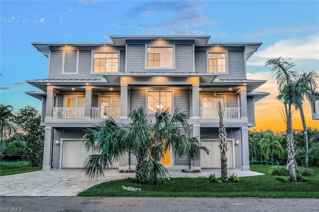 New Build! A Gulf front coastal contemporary dream home offering stunning sunsets and views of the Gulf of Mexico. Nestled on a private street in the prestigious gated community of Hideaway Beach Club, this custom-built residence promises scale, space, light, exclusivity, ocean views, and luxury amenities. This grand home features 5 airy bedrooms and 3.5 baths within 4,610 square feet, totaling 8,548 square feet of refined designer appointments, outdoor living spaces, and upscale architectural details. The living level boasts sweeping ocean views, an open great room with volume ceilings, formal living and dining areas, a loft seating area and office space. The Chef's kitchen features quartz counters and center island, dual sinks & ovens, a walk-in pantry, and an open breakfast area overlooking a terrace lanai with a built-in outdoor grilling station. The spacious primary ensuite includes his and hers walk-in closets and a spa-like bath with a soaking tub. On the 2nd level is a loft-style great room with a wet bar that serves as the common area for 4 large bedrooms with sprawling baths, a large shared terrace, and 2 balcony lanai's for indoor/outdoor living. Notable features include a 3-story elevator, wide plank wood-look porcelain tile flooring throughout, a Control4 home automation system, and an aluminum standing-seam metal roof. The climate controlled garage accomodates up to 8 cars with 2 extra deep 38' areas, with a high ceiling to accommodate more cars with car lifts. The residence is surrounded by lush tropical landscaping and offers full hurricane protection, including a whole-house generator. Enjoy the ultimate Hideaway Beach Club amenities: 2.5 miles of white sand beach, Gulf front beach club, community pool, 4 restaurants, access to the NEW $30M, 34,000SF Sports and Wellness center, a putting green and executive golf course, tennis courts, bocce, pickle ball, retail services/pro shop, bike, golf cart, and jogging paths, picnic area and barbecues, conservation area, private lagoon, fishing, playground, and dog park. There is a one time $125,000. capital contribution to Hideaway Beachclub for new member. Incomparable at $954.45 per SF for new construction of this size home. Live lavishly at 700 Waterside. An exceptional new construction home defined by scale, craftsmanship, and Hideaway Beach Club living.