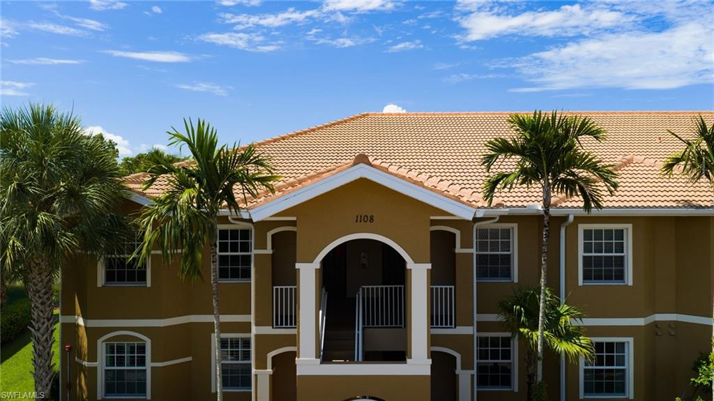 One or more photo(s) has been virtually staged, AI generated or rendered.  Discover resort-style living in the sought-after gated community of Casa Di Fiori in Cape Coral! This well-maintained 3-bedroom, 2-bath second-floor corner unit condo with a detached one-car garage offers the perfect blend of comfort, convenience, and the relaxed Southwest Florida lifestyle you are searching for. Inside, you’ll appreciate the highly desirable split-bedroom floor plan, creating privacy for owners and guests alike. The light and neutral interior palette provides a timeless backdrop and a blank canvas ready for your personal style and design preferences. The open-concept living and dining spaces create an inviting atmosphere for everyday living or entertaining. The detached one-car garage features durable epoxy flooring, providing a clean and functional space for parking, storage, hobbies, or your beach, fishing, and golf gear. Beyond your front door, Casa Di Fiori offers an exceptional amenity package designed to feel like a private resort. Enjoy a sparkling resort-style swimming pool with spa, a spacious clubhouse with social areas, fitness center, tennis and pickleball courts, bocce, billiards, outdoor gathering spaces, and beautifully maintained grounds. Conveniently located in Northeast Cape Coral, this condominium places you just minutes from shopping, restaurants, entertainment, and major roadways, offering easy access to Fort Myers, Southwest Florida beaches, and everything the Gulf Coast lifestyle has to offer. Whether you are searching for a full-time residence, seasonal Florida retreat, or low-maintenance investment property, this Casa Di Fiori condo delivers the ideal combination of location, amenities, and carefree living. Schedule your private showing today and experience why so many buyers love the Casa Di Fiori lifestyle!