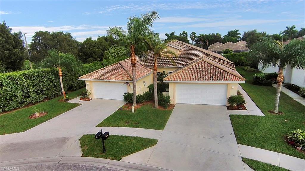 Absolutely Pristine 2 Bedroom/ 2 Bath Plus Den and 2 Car Garage 2005 Built Attached Villa in Lely Resort Offers a Comfortable 1,590 Square Feet of Living Space!  The Eat-In Kitchen Reveals Cherry Cabinetry and Solid Surface Counter Tops, the Dining Area Features a Beautiful Inlaid Tongue in Groove Tray Ceiling, the Home is Dressed with Soft Hues and Large Block Tile with a Great Room Floor Plan Leading to an Expanded and Private Lanai Perfect for Entertaining All Just Steps to the Community Pool! You'll Enjoy the True Southwest Florida Lifestyle at Lely Resort with its 3 Championship Golf Courses, Har-Tru Tennis Courts, the Fabulous Resort Style Players Club and Spa with a State of the Art Fitness Center, Spa Services, Lap Pool, Lagoon Pool, Poolside Tiki Bar, Bocce, Full Service Restaurant and More!