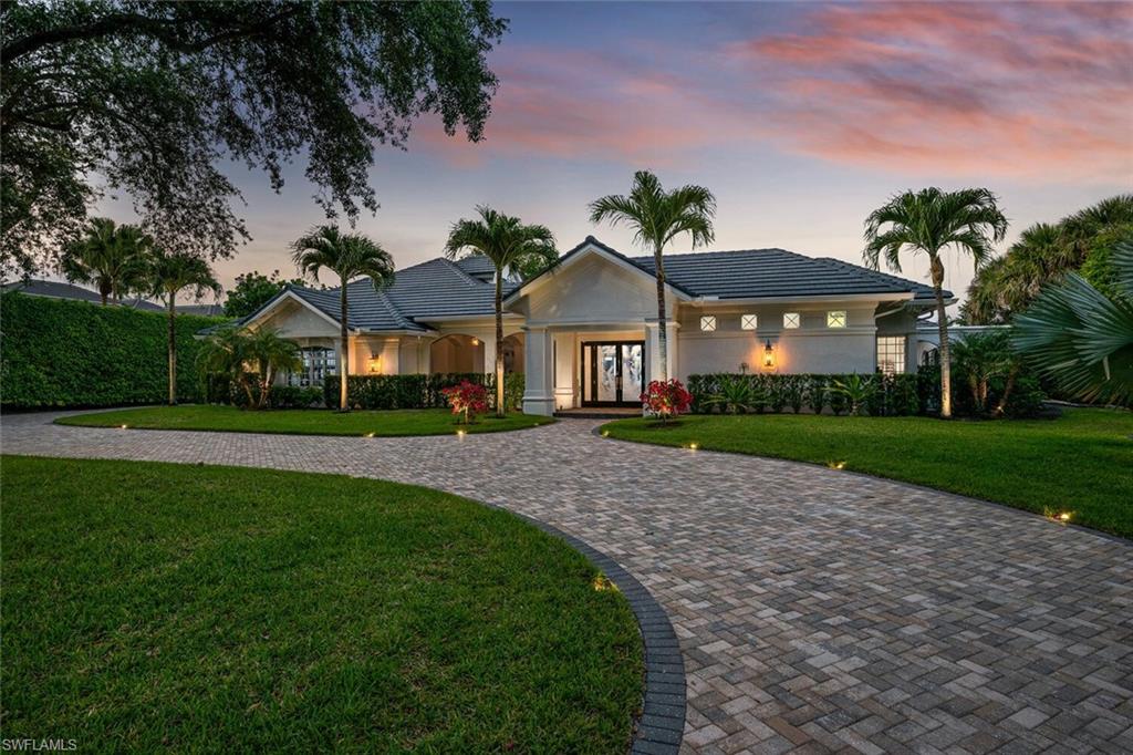 You have just found your home!  Sprawling on over half acre of beautiful lake and golf views, this contemporary, chic, yet comfortable Estates residence has luxury finishes throughout.  The renovated courtyard pool is a resort oasis for your family, with ultimate privacy for entertaining by the pool, and spectacular views of the 5th Fairway, for al fresco dining in back. This bespoke residence has two Master Suites, with large, walk-in custom closets, and Guest Cabana on first level, with a private, loft bedroom upstairs, overlooking the pool.  Gourmet, open-floor plan kitchen and bar come equipped with two dishwashers, Miele wine refrigerator, ice maker, two separate beverage refrigerators, and gorgeous, custom Sycamore topped wet bar and matching tasting table. The architectural ceiling and lighting details are evident throughout the home, and every room has beautiful views of either the pool or the lake and golf course.  This residence has all you need with Crestron system, reverse osmosis, new roof in 2021, three-car garage, and the Buzz Off in courtyard and back lanai will make evening entertaining a pleasure! This furnished residence in Grey Oaks awaits you...welcome home!