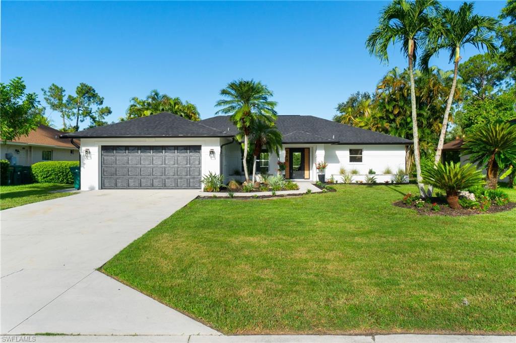 Experience the ultimate in privacy and luxury in this beautiful Palm River Estates home, inspired by the tranquil beauty of Tulum, Mexico. This fully renovated gem features three spacious bedrooms and two luxurious bathrooms, perfectly blending charm with modern amenities. The home was renovated by Monica Miraglilo, Founder & CEO of  Miraglilo Properties and Girlbuild.  Monica is known for thinking outside the box and creating spaces that have their own identity and this property certainly displays Monica’s vision for a beautiful and timeless foundation.  As you drive through the serene, tree-canopied street, you'll appreciate the privacy and tranquility that surrounds this exquisite property. Step inside to find an open-concept living space bathed in natural light, with a tongue & groove vaulted ceiling highlighting the meticulous attention to detail and high-end finishes.  To top it off, a brand new roof was installed in 2024 to give the new owners long lasting peace of mind,

The heart of the home is the stunning kitchen, equipped with top-of-the-line appliances, sleek cabinetry, and elegant countertops. The living and dining areas flow seamlessly to the outdoors, creating an ideal space for entertaining and relaxation in the expansive lanai surrounding the stunning pool.

The extra yard space beyond the lanai offers endless possibilities for gardening, play, or simply enjoying the lush, tropical landscaping. Additionally, this home is located in the A-rated school district of North Naples and is on the electrical grid for the nearby hospital, making power outages unlikely.

Don't miss your chance to own a piece of paradise in one of Naples' most sought-after neighborhoods.