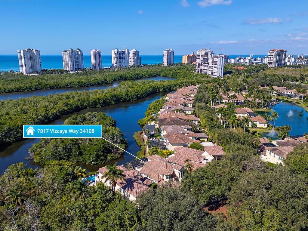 PERFECTION! This Re-Mastered Bayfront Bay Colony Vizcaya GEM enjoys cherished private and peaceful southwesterly Bay and Rookery Island views, while also being tucked away on a tranquil Vizcaya cul-de-sac. This proud beauty boasts hurricane impact windows throughout, dramatic soaring ceilings, custom wood flooring, a beautiful chef’s custom kitchen, plus an owner’s suite touting a delightful, generous Zen owner’s spa bath. The magical expansive outdoor waterfront spaces and places are an ever-sunny invitation for one to bask, dine, or float the day away in quiet relaxation, while being wrapped in tranquil tropical natural beauty. Bay Colony is the gated, 5-Star Concierge Level Gulf-Front Community touting private membership-included privileges of The Bay Colony Gulf Front Beach & Dining Club, attended beachfront services, and the just re-mastered and very active Bay Colony Tennis Club. Further, all Bay Colony owners also enjoy all the many membership-included privileges of The Pelican Bay Community: 2.5 miles of pristine beaches, 2 additional members-only Gulf-Front Restaurants & Sports Bars, attended beachfront services, state-of-the-art attended Fitness, Life Long Learning Center, 18 Har-Tru® Tennis Courts, new Pickleball Center, plus miles of hiking, biking, and nature walking paths and so much more! Artis Naples Performing Arts Center, Naples Gulf Front Ritz-Carlton Hotel, upscale Waterside Shops, and lively Mercato are all just steps away!