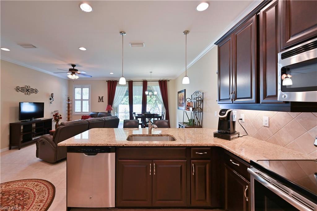 2nd chance at this beauty. BACK ON THE MAKET. This 2 bedroom, 2.5 bath (double master suite) home has it all; 42 inch modern cabinets, backsplash, CROWN molding, GRANITE THROUGHOUT the kitchen & bathrooms, 18 in tile in the main areas, an upgraded master bathroom with a frameless shower door, WASHER & DRYER, plantation shutters, HOME WARRANTY, and a preserve view with extra landscaping added in the back. This floorplan is not longer being built, it has a larger lanai, an extra back door slider, and extra windows when compared with the new construction models. The bedrooms are both upstairs along with the laundry room and there is a half bath downstairs. Lindsford is centrally located in Fort Myers close to shopping, restaurants, beaches, historic downtown, and the airport. Lindsford townhomes is a beautiful gated community with multiple lakes and a large community pool. The HOA fees are some of the lowest in Fort Myers at $139/mo and INCLUDES LAWN MAINTENANCE. Call today for a showing, this home is priced to sell and won't last!