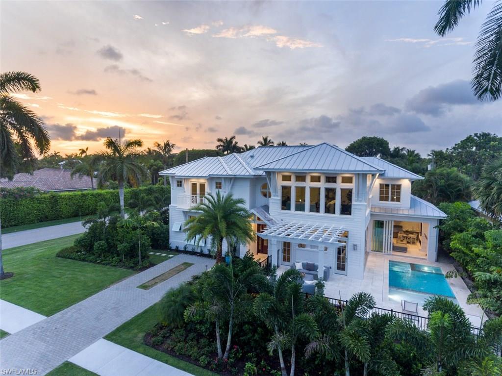Crosswinds Cottage is an exquisite custom design penned by MHK architects and masterfully crafted by Gulfstream Homes. Just a few blocks off the beach and 5th Ave S. Luxurious finishes were expertly selected exuding quality and craftsmanship. Wolf/Subzero, Legno Bastone French Oak floors throughout, Ruffino Cabinetry, and rare earth stones such as Cristallo Extra and Sea Pearl quartzite grace the counters. Imported Italian tile by Porcelanosa highlight feature walls and adorn the baths. The custom glass enclosed wine display is a centerpiece of the great room. A true all season outdoor kitchen and living space can be air conditioned or open to the pool and patio. Multiple outdoor gathering and lounge areas host the Neapolitan lifestyle. The upstairs offers a large guest loft with wet bar and an oversize den-media room for multiple uses. A VIP suite in addition to 2 large suites create the comfort and luxury that discerning guests will appreciate. Control4 home automation controls the lighting, Nest thermostats, Sonos audio, and security remotely. Landscape architecture by renowned Christian Andrea. The finest new residence in Old Naples is now available.