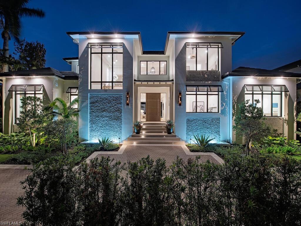 This stunning new construction (2024) residence is the result of a brilliant collaboration between Seaside Builders, Kukk Architecture, and the renowned designers at Clive Daniel. Exuding exceptional quality, the home spans an impressive 7,695 square feet and sits on an oversized lot. With 7 luxurious bedrooms and 9 bathrooms, it’s the ultimate retreat for hosting family and friends. The interior features Legno Bastone wide-plank white oak floors, seamlessly blending elegance and durability. This smart home is equipped with a cutting-edge ELAN automation system, Lutron lighting, and built-in electric shades for effortless control. A chef's dream kitchen awaits, featuring premium Wolf and Sub-Zero appliances. The outdoor space is equally captivating, boasting fire features, a fire pit, and an infinity-edge pool. An additional highlight is the private guest cabana with a separate entrance. For peace of mind, the home includes a whole-house generator. Car enthusiasts will appreciate the spacious 4-car garage accessible via the alley. Located just two blocks from pristine white sand beaches and close to the vibrant shopping and dining scene of 3rd Street South, this home truly offers the best of luxury living.