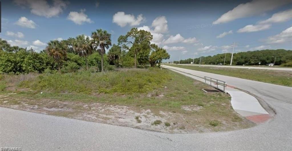 Zoned Commercial/OMI, these adjoining Lots 18 and 19 offer more than one-half acre of prime, buildable commercial property with outstanding visibility along SR 776 (McCall Road). Located on one of the area's busiest corridors, the property benefits from high traffic counts and convenient access between Port Charlotte, Englewood, Manasota Key, and Interstate 75.

Situated on the access road, this desirable corner parcel provides safe, convenient ingress and egress for customers and deliveries. According to the county, public water is available, making this an excellent opportunity for a wide range of commercial development.