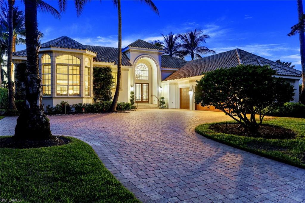 This wonderful Port Royal residence awaits! Start living your spectacular winter months Naples style!! Nearly 6,000 feet of spacious and splendid air-conditioned living space, grand 12’ ceilings, fantastic pool / spa area with summer kitchen. Catch a favorite movie on your lanai, light the gas fireplace, enjoy! All bedrooms are large & have their own full ensuite bath. Abundant living areas & outdoor / lanai areas make SO many spaces to relax and unwind. Wood plank & marble floors, light & sunny, master bath with separate “his and hers” design,  2 fireplaces, 3-car garage, large lot. Excellent layout with kitchen open to family room plus tremendous additional multi-purpose great room with elegant coffered ceilings. Designed to accommodate every lifestyle for maximum enjoyment. This home lives beautifully. All living areas & bedrooms are on one floor except for one 2nd floor guest suite. Walk to the Port Royal Club for dining, beach, tennis, fitness and beachside pool with dining area.  Looking for a home that delivers a peaceful soothing environment and feels great with plenty of room to move around? Come see for yourself. Port Royal resident membership eligible.