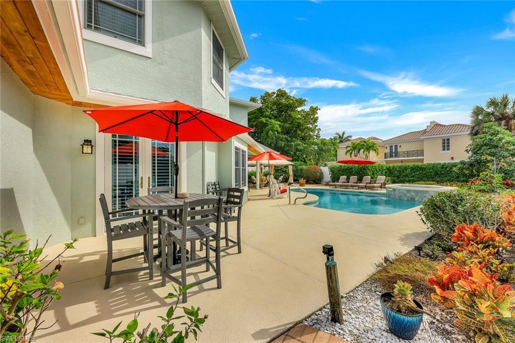 The perfect coastal retreat just four blocks from the beach and moments from the charm of downtown 5th Avenue South. Perfectly situated in the heart of Olde Naples, this residence blends timeless design with modern sophistication, offering five bedrooms plus a den, five baths, and over 4,300 square feet of refined living space. Every detail has been thoughtfully curated, from the Andersen hurricane-impact windows and doors to the dual Trane HVAC systems and integrated smart-home features that bring both comfort and peace of mind.

Step inside and you’ll immediately feel the craftsmanship that defines this home. The main level showcases striking Turkish marble with onyx inlay flooring, while the upper level features warm Brazilian mahogany underfoot. The gourmet kitchen is the centerpiece of the home, complete with custom cabinetry, chef worthy appliances, granite countertops, and a reverse osmosis system - an ideal space for both everyday living and entertaining. The open and inviting layout flows effortlessly into multiple gathering areas, creating a sense of ease and connection throughout.

Upstairs, the private bedroom suites provide serene escapes, each designed with elevated finishes and spa-inspired bathrooms. A versatile first-floor den offers flexibility for a home office, reading nook, or guest retreat, while dual laundry rooms add convenience to daily living.

Outside, the property continues to impress with its lush landscaping, sparkling pool, and private, fenced backyard - perfect for entertaining or enjoying quiet evenings under the stars. The home also offers dual street access from both the front and rear alley, and engineered blueprints are available for a future two-story garage with an upstairs cabana for added versatility.

Positioned within the desirable Flood Zone X500, the property remained high and dry during recent storms, offering both security and peace of mind. With its close proximity to Naples’ sugar-sand beaches, fine dining, boutique shopping, and the cultural energy of 5th Avenue, this home delivers the quintessential Olde Naples lifestyle. Experience the rare blend of coastal charm, luxury finishes, and everyday livability - schedule your private showing today and step into the lifestyle you’ve been dreaming of.