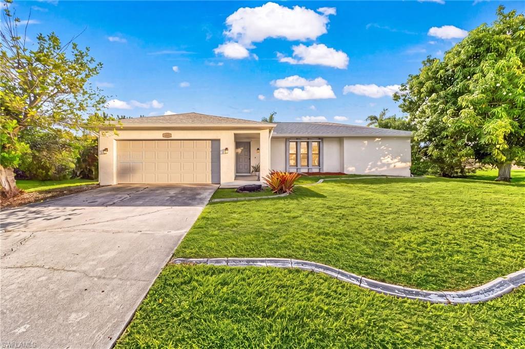 SW Cape Charmer at an Outstanding Price! Discover the perfect blend of comfort, quality, and location in this beautifully maintained CBS home nestled in one of Southwest Cape Coral's most established and desirable neighborhoods. Offering 1,751 square feet of thoughtfully designed living space, this three-bedroom, two-bath residence has been lovingly cared for and is ready for its next chapter.

The spacious floor plan is designed for comfortable everyday living and effortless entertaining, featuring an updated kitchen that flows seamlessly into the main living areas and a separate family room, providing the perfect gathering space for family and friends. Fresh interior paint creates a bright, move-in-ready interior, while a newer air conditioning system, garage door, and a new shingle roof installed in 2023 offer lasting value and peace of mind.

Step outside to the screened lanai overlooking a generous backyard with plenty of room to create your own private tropical retreat. Whether you envision a custom swimming pool, outdoor kitchen, or expanded entertaining space, the possibilities are endless. Even better, the home already includes a convenient pool bath, making future pool construction both practical and cost-effective.

A mature mango tree graces the front yard, adding shade and fresh seasonal fruit that perfectly complements the Southwest Florida lifestyle. 

Ideally situated in sought-after Southwest Cape Coral, this home offers convenient access to Chiquita Boulevard and Cape Coral Parkway, placing shopping, dining, healthcare, parks, golf courses, marinas, and the white-sand beaches of Southwest Florida just minutes away.

Competitively priced and offering exceptional value for the home, updates, and highly desirable location, this move-in-ready property is an outstanding opportunity for first-time homebuyers, those seeking a seasonal Southwest Florida retreat, or investors looking to add a quality property to their portfolio.

Whether you're beginning your homeownership journey, searching for the perfect winter escape, or expanding your investment portfolio, this exceptional Southwest Cape Coral residence offers a rare combination of location, quality, and value that's not to be missed. Come experience the warmth, comfort, and Florida lifestyle that make this home truly special.