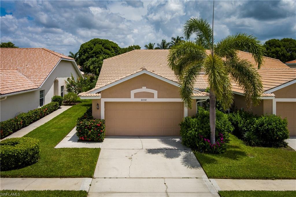 Absolutely gorgeous, 2 bedroom, 2 bath plus den attached villa in the gated community of Calumet Reserve in Lely Resort. Home shows like a model and will transfer turnkey furnished.  Some features of the villa are an updated kitchen with 42" cabinets, granite countertops, Frigidaire Gallery stainless steel appliances, wood floors, updated bathrooms, designer furnishings, plantation shutters, pool, expansive and private backyard, 2 car garage, roof replaced in 2025 and water heater in 2026.  Calumet Reserve offers residents an updated clubhouse and heated pool.  Low HOA fees.
Lely Resort has 3 championship golf courses, many restaurants, shopping, medical facilities, and much more.   Lely Resort is a short drive south to the white sand beaches of Marco Island or drive west to downtown Naples and all the activities on 5th Avenue, 3rd street, Gulfshore Playhouse, Tin City, boating and the Gulf beaches.  Welcome to Calumet Reserve and Your Piece of Paradise !